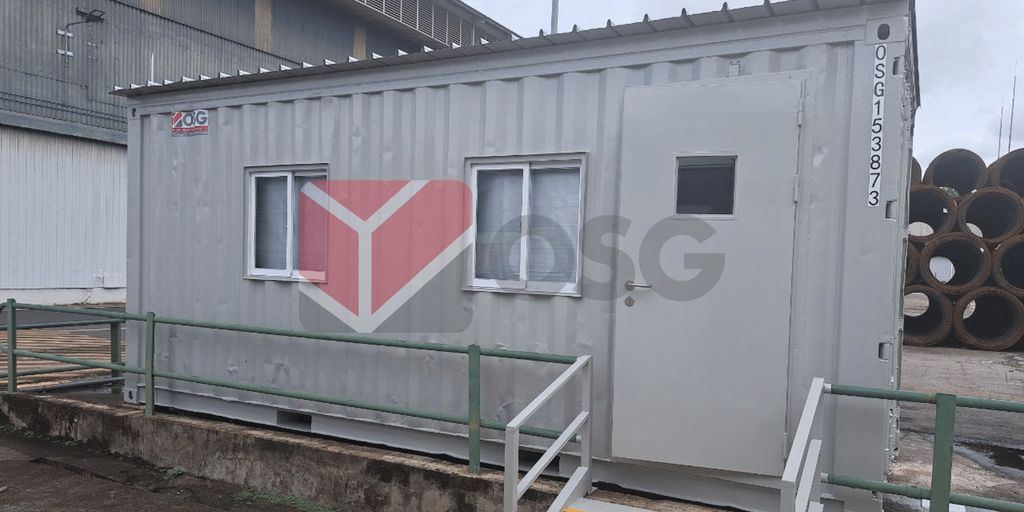 Portable storage container with windows located at a facility.