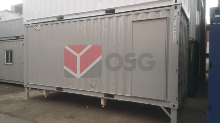 Image shows a shipping container with a door and logo.
