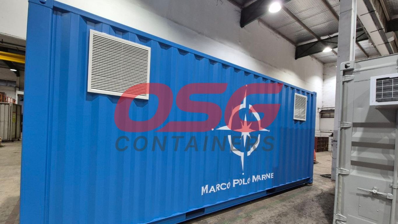 Blue shipping container with ventilation units and company logo.