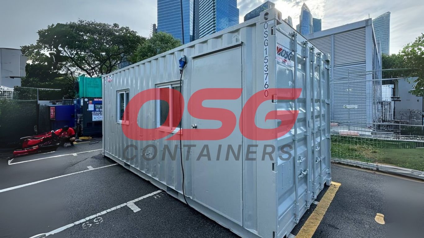 A portable container office with a window and door.