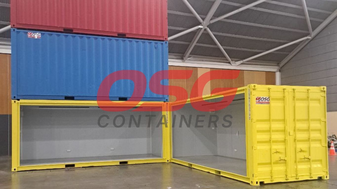 Stacked shipping containers in red, blue, and yellow colors.