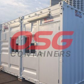 White modular containers with windows and doors, OSG logo.
