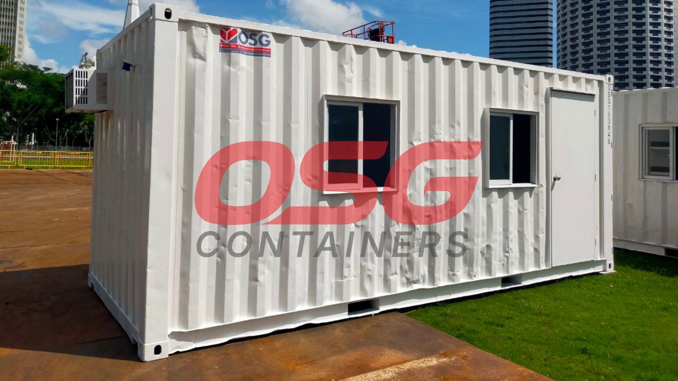 White shipping container office with windows and door.