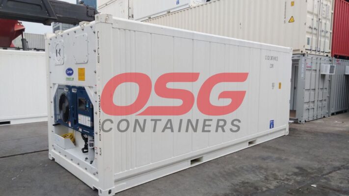 A white refrigerated shipping container with a Carrier unit.