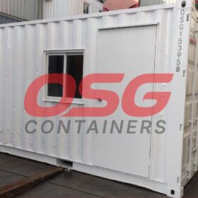 White shipping container office with windows and door.