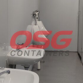 A clean, modern restroom with sinks and urinals.