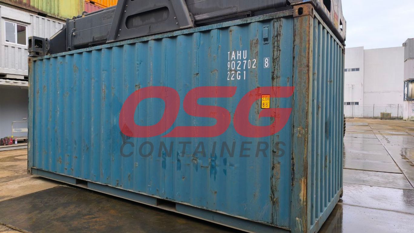 A blue shipping container with the OSG Containers logo.