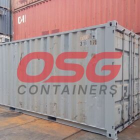 OSG Containers logo on a shipping container in a yard.