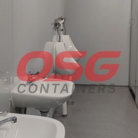 A clean, modern restroom with sinks and urinals.