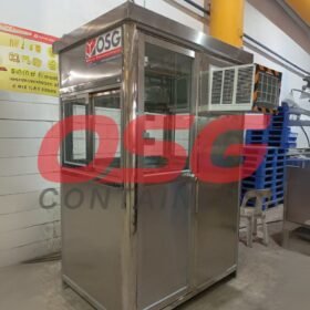 A stainless steel guard booth with windows and an air conditioner.