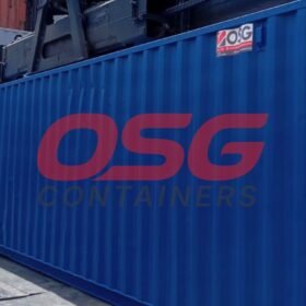A blue shipping container with OSG logo and text.