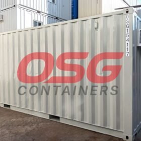 OSG containers stacked with an air conditioning unit attached.