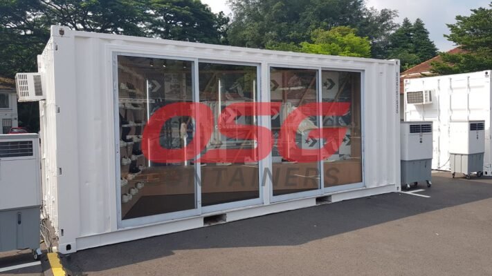 White shipping container converted into a Converse store.