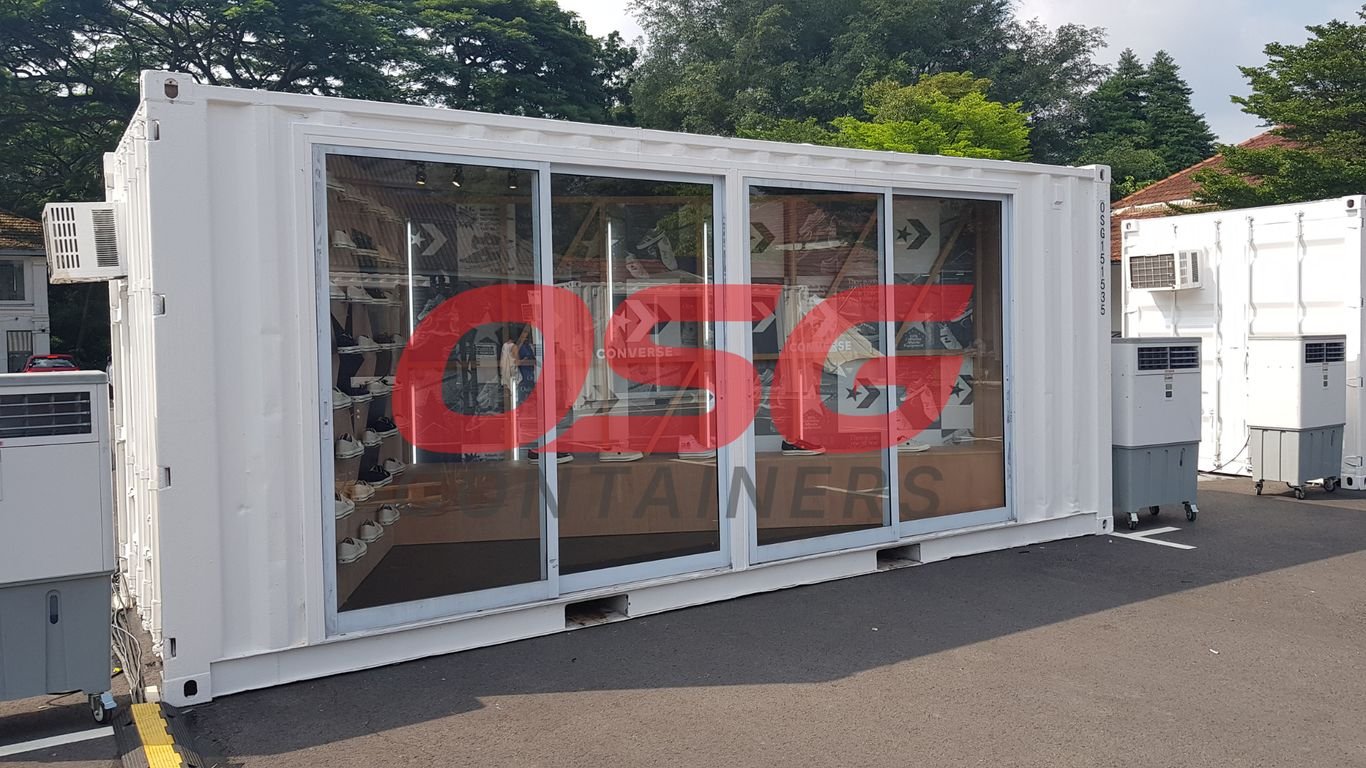 White shipping container converted into a Converse store.