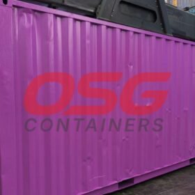 A bright purple shipping container with OSG Containers logo.