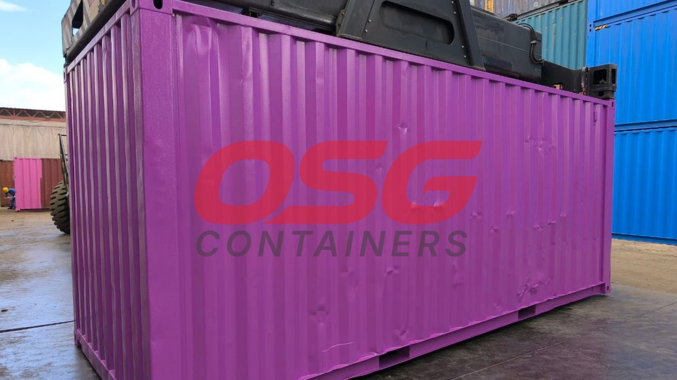 A bright purple shipping container with OSG Containers logo.